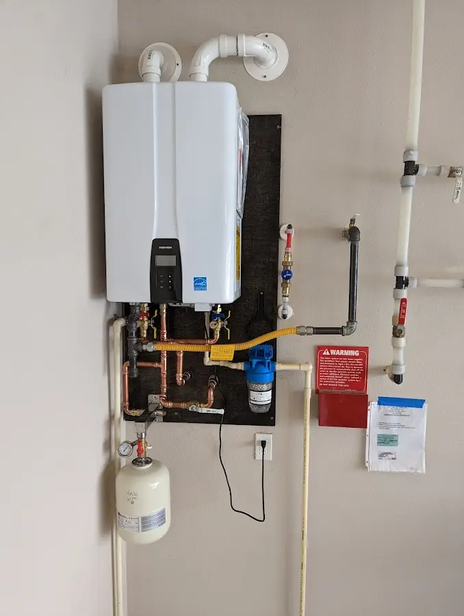 Professional plumber installing copper piping in a Lake Murray of Richland home